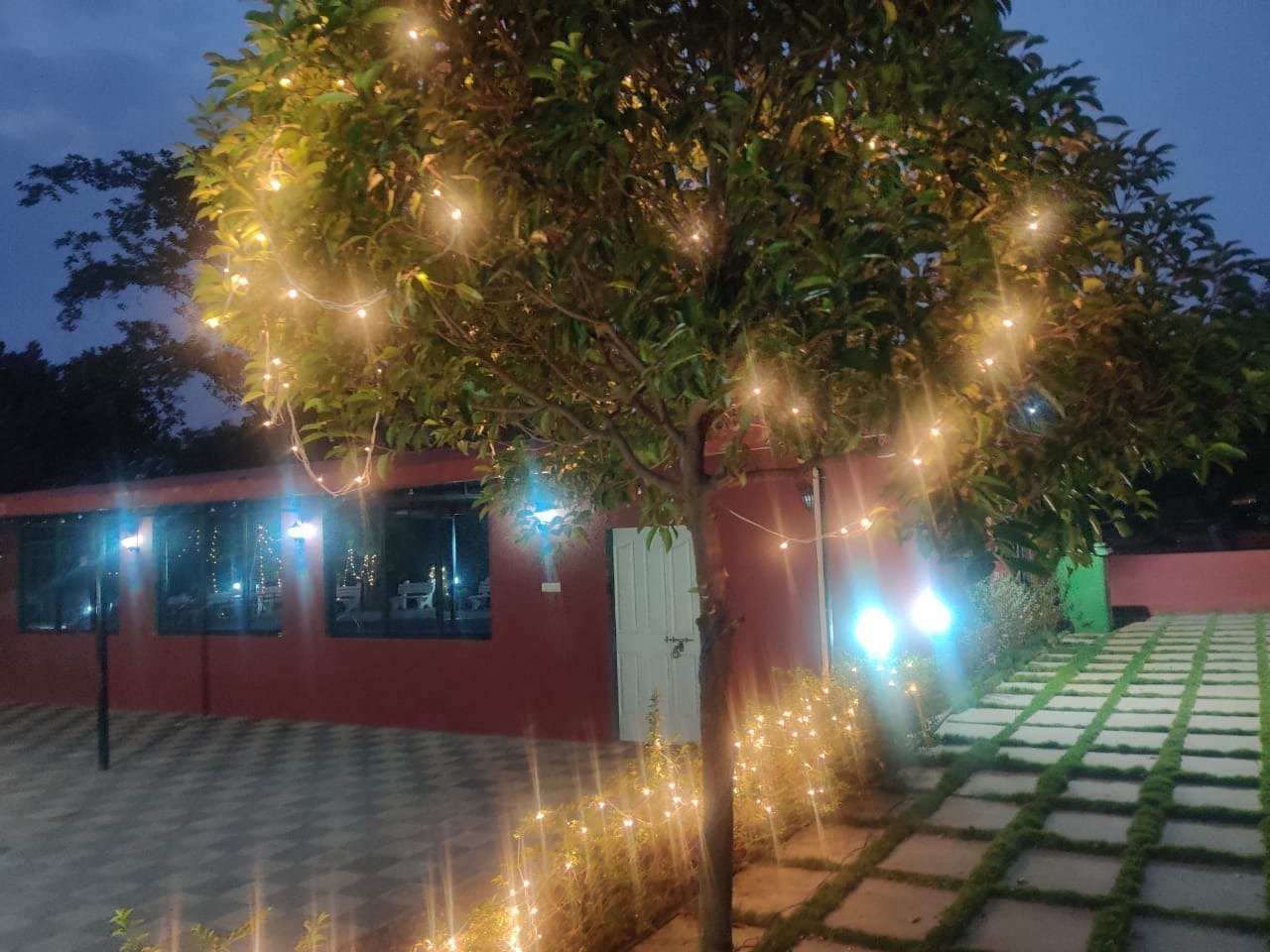 Night lighting view near cottages in Farm House of Karjat giving very pleasant look